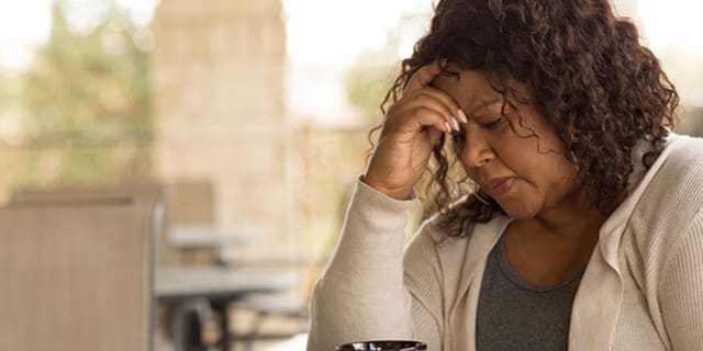 A woman looking sad and depressed