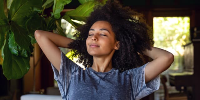 A woman breathing easily