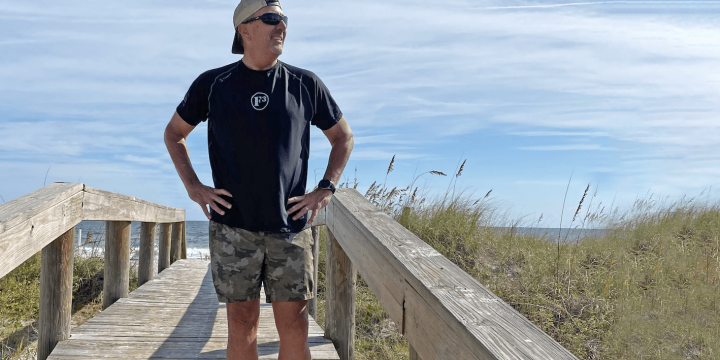 A man enjoys the beach after hernia surgery