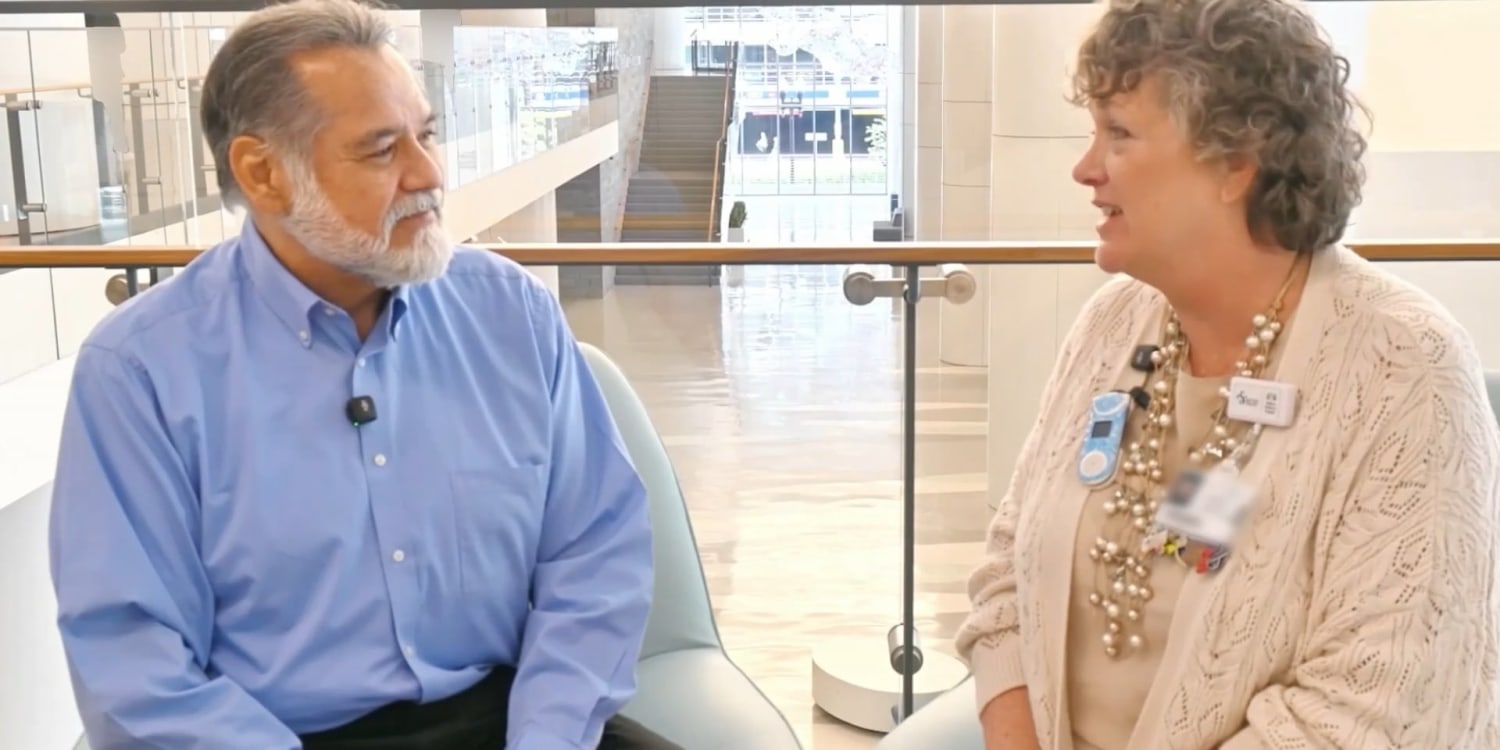 man and woman sitting in the lobby of the Borowy Tower
