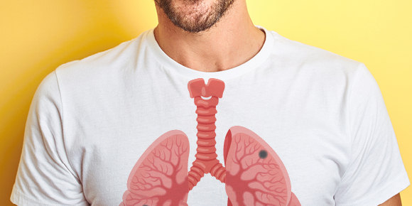 A man wearing a t-shirt with a lung graphic