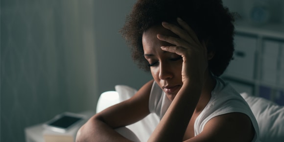 a woman having trouble sleeping