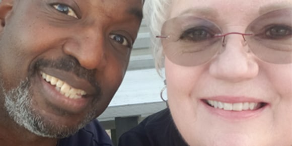 close up shot of a man and woman's faces