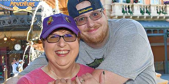 smiling man and woman at Disney