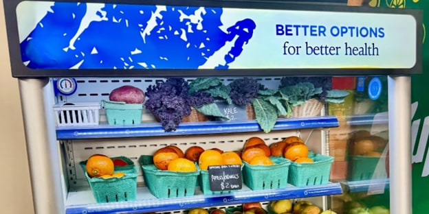 Fridge filled with fresh fruits and vegetables