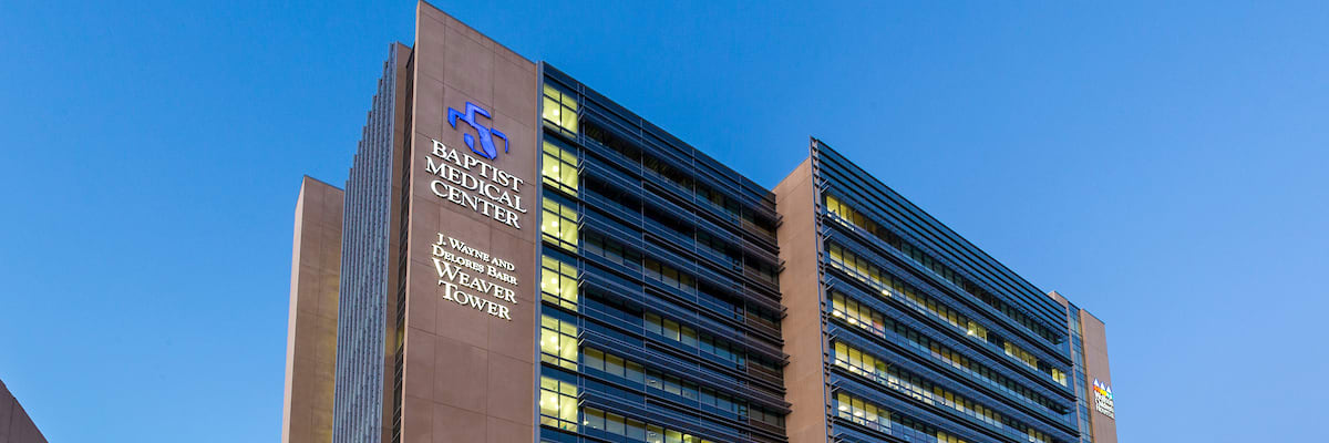 exterior shot of the top of Baptist Medical Center - J Wayne and Delores Barr Weaver Tower