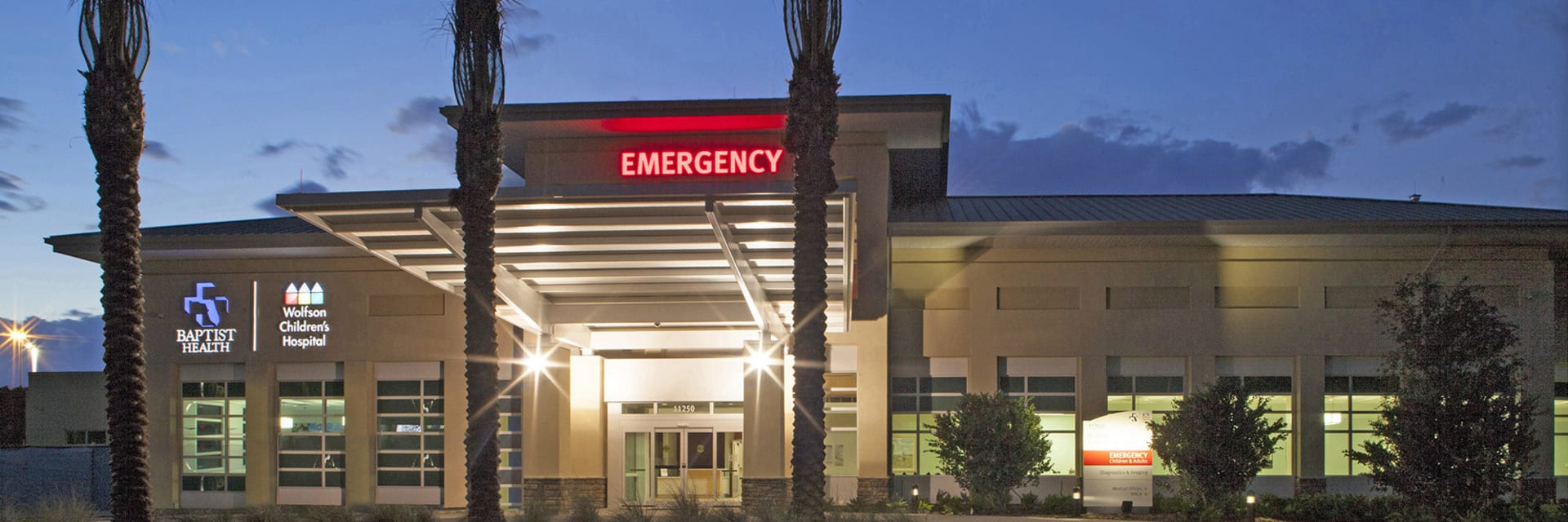 Exterior of the Baptist and Wolfson North emergency room at nightti