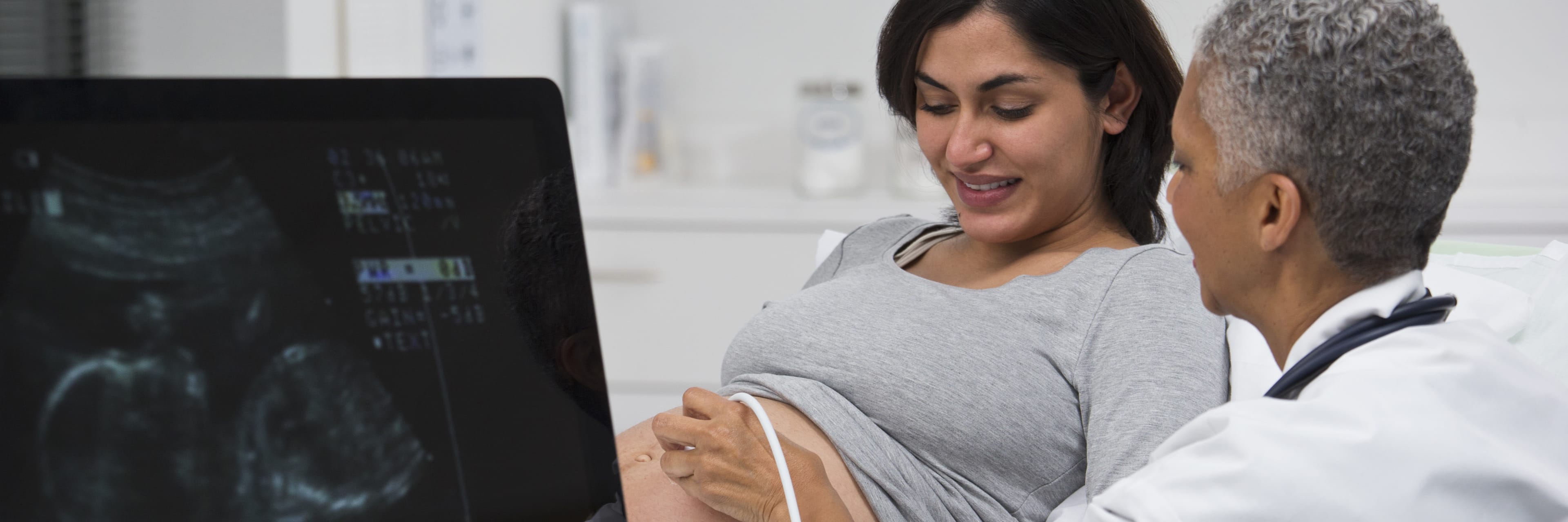 pregnant woman receiving and ultrasound