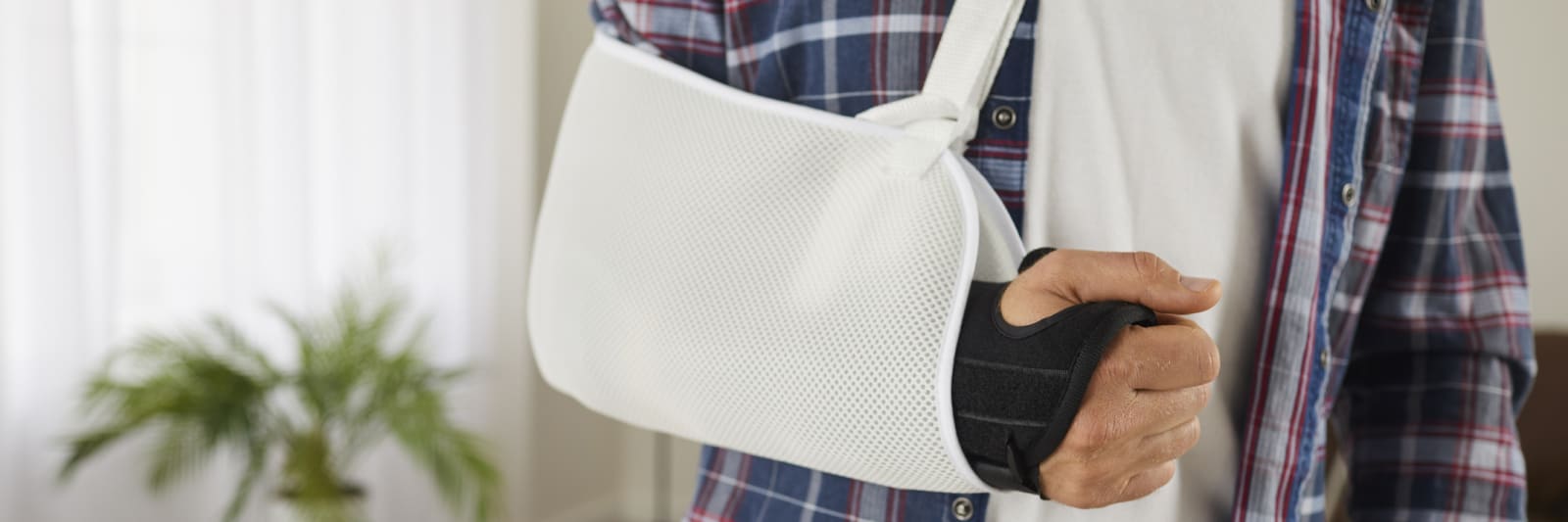 a patient in an arm sling