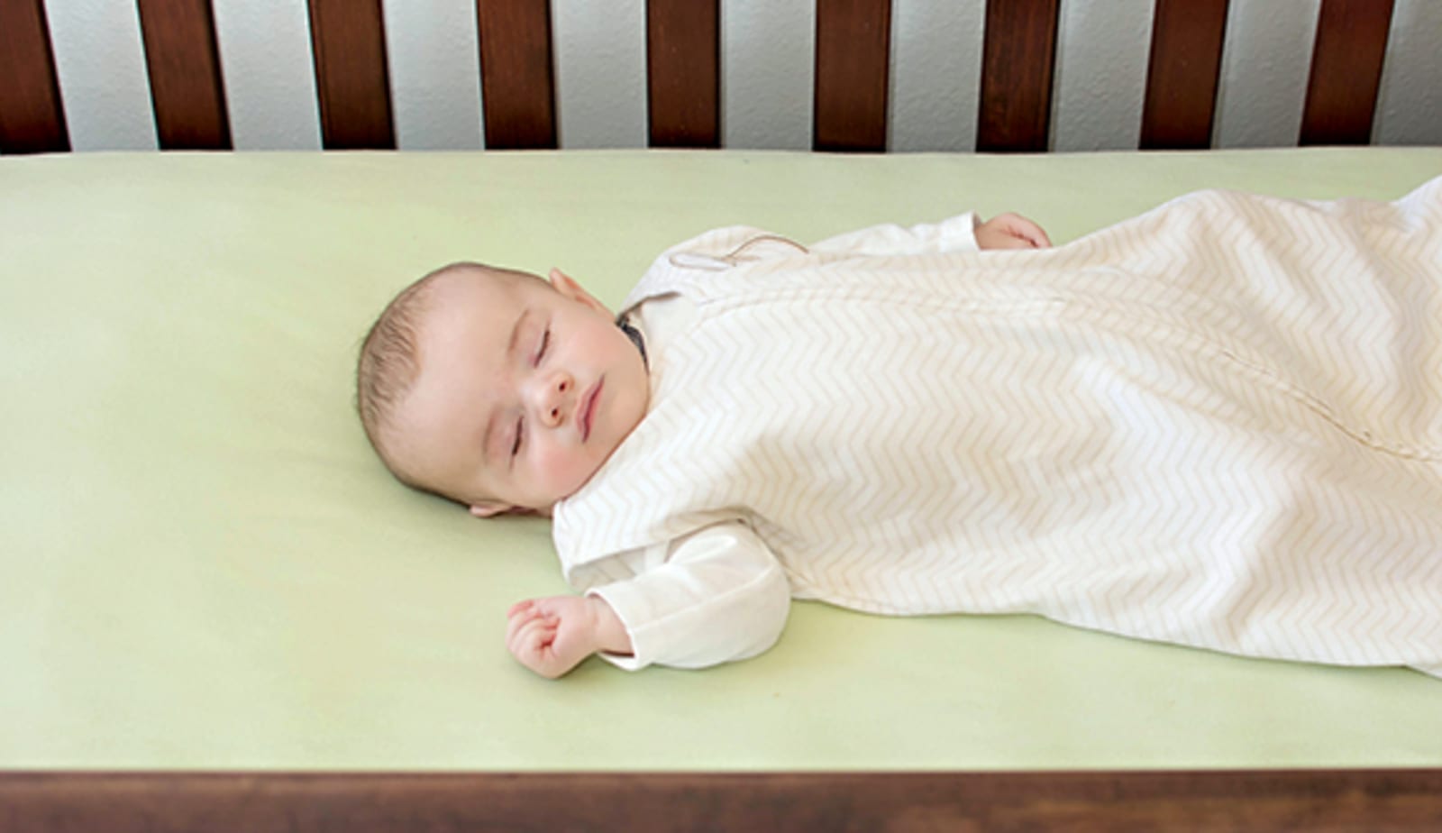 Safe sleeping position on back for infant