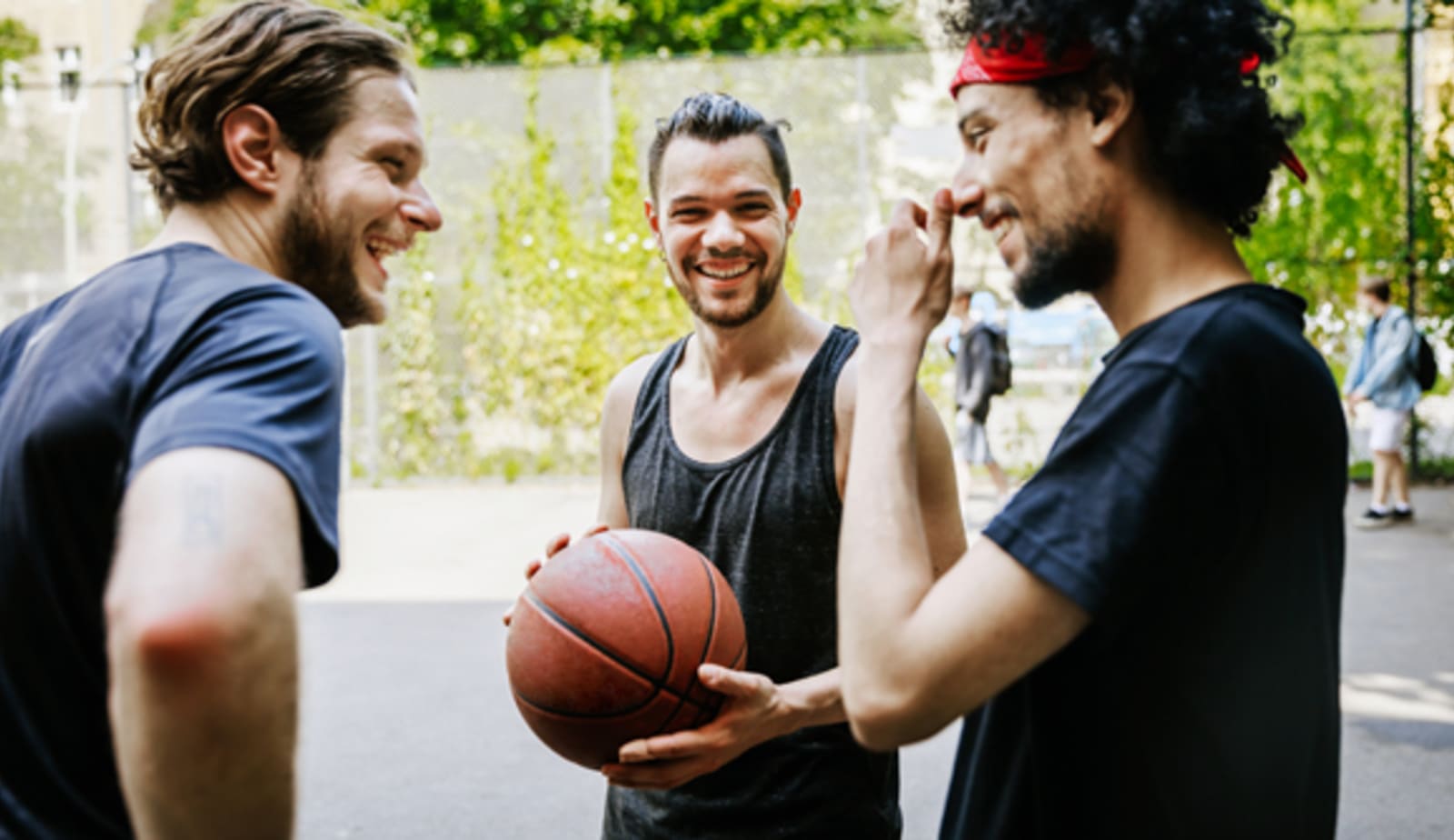 men playing basketball as a form of self care