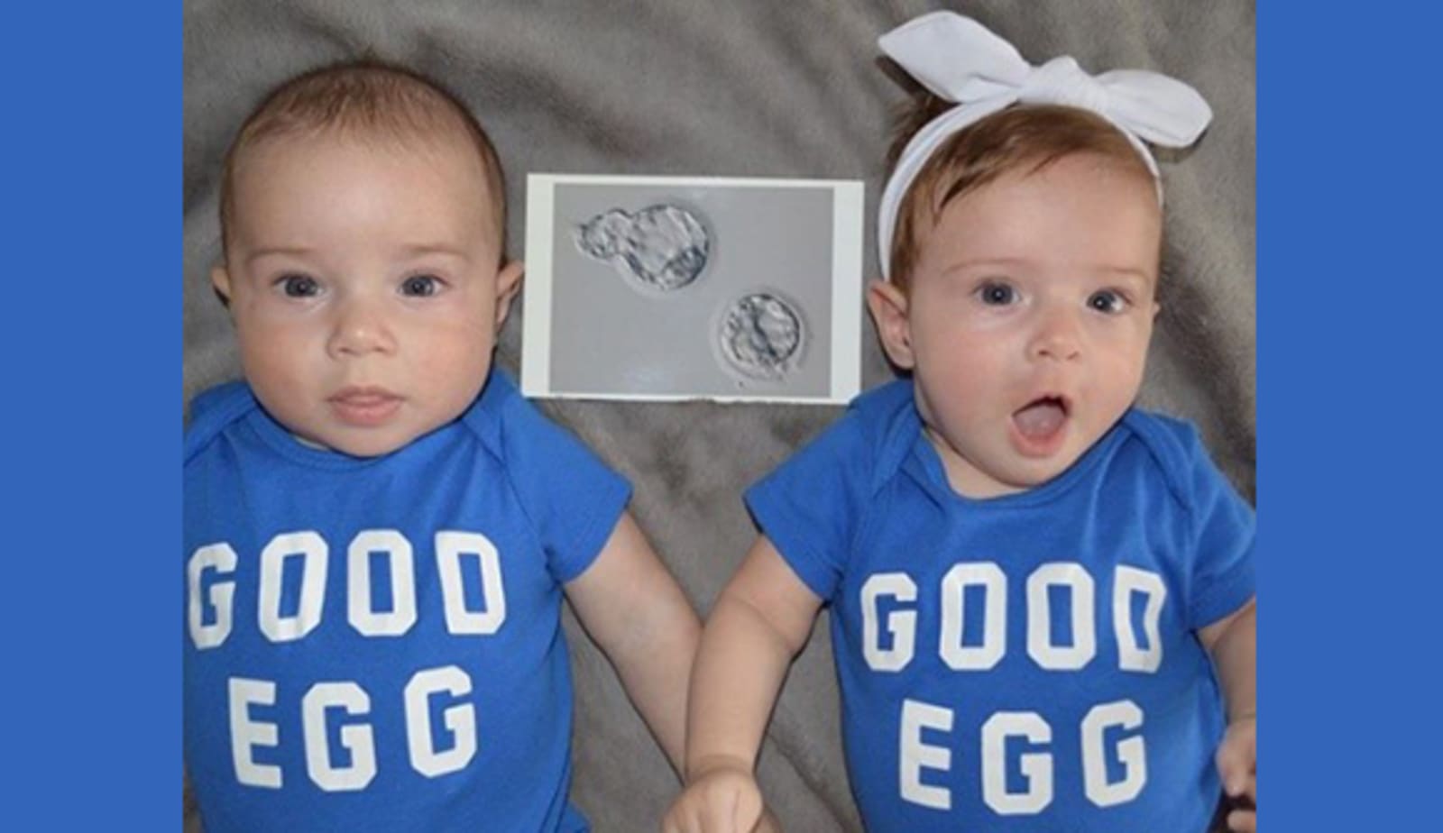 Sara Walsh's boy/girl twins wearing onesies that say "Good egg" with a photo showing microscopic embryos.