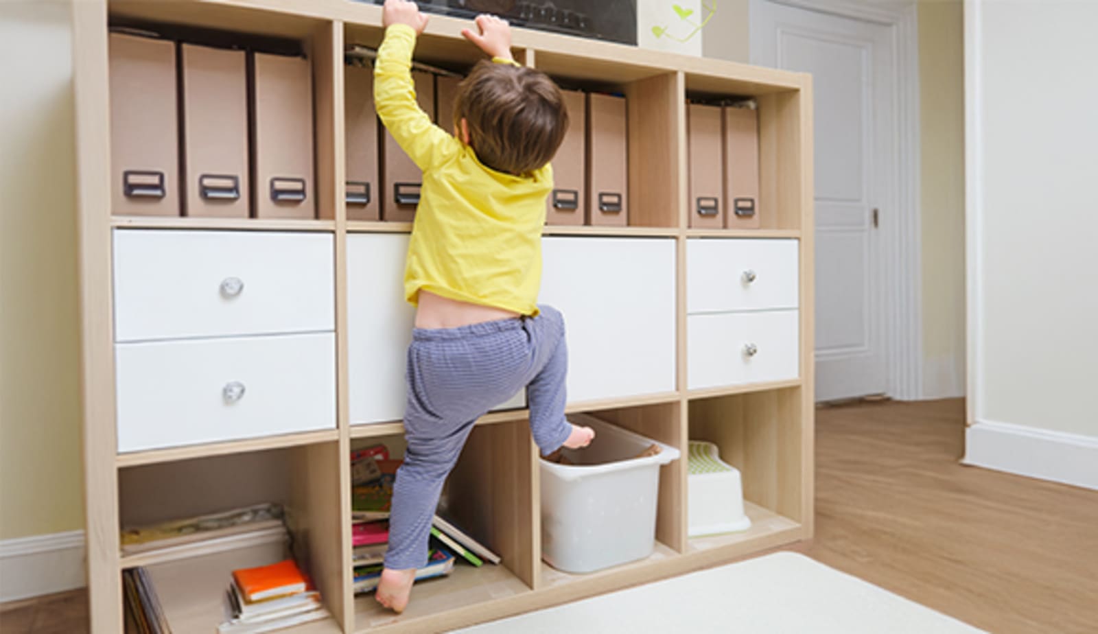Child climbing furniture