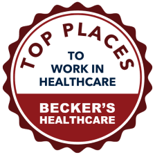 maroon and white award badge that says "Top Places to Work in Healthcare - Becker's Healthcare"