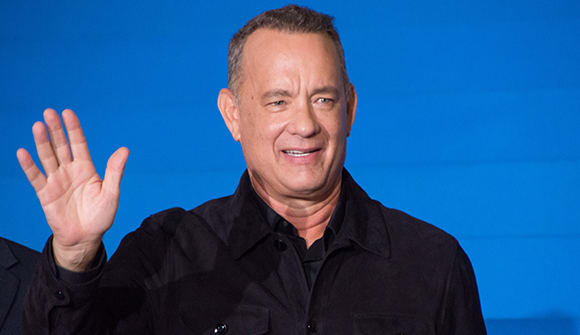 actor Tom Hanks waving