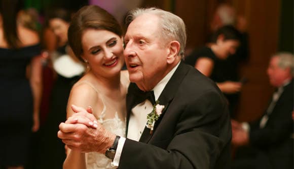 Wesley Roberts dancing with her grandfather at her wedding