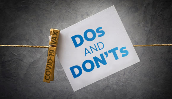 image of the words "Dos and Don'ts" and "covid-16 vax" on clothes line