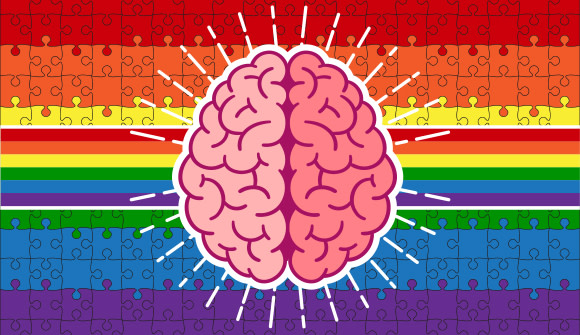 graphic depiction of brain on a rainbow colored puzzle