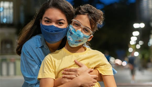 Mom and child in masks