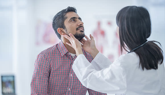 A patient being checked for HPV-related throat cancer