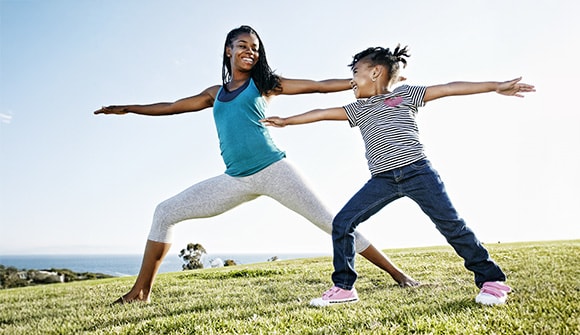 Woman and child stretching