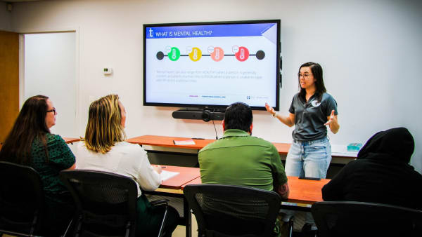 teen giving a presentation on mental health