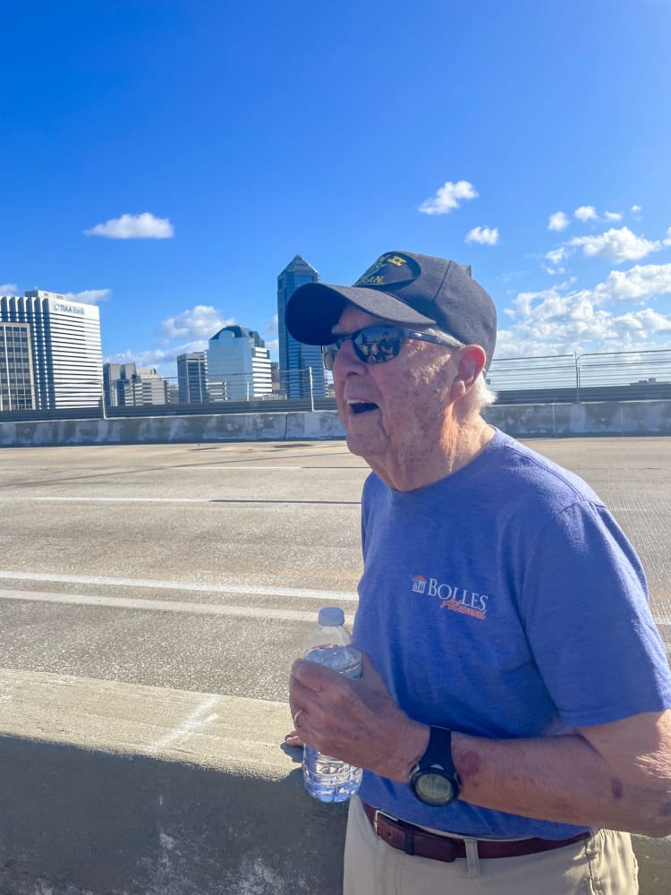 senior man in hat on Acosta bridge in Jacksonville, FL