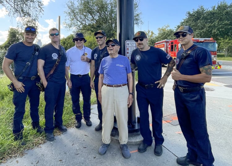 Rufus McClure standing outside with a crew from the Jacksonville Fire and Rescue Department