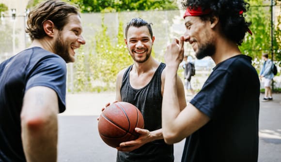 men playing basketball as a form of self care