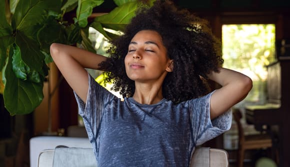 A woman breathing easily