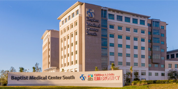 exterior shot of baptist medical center south with curved sign in the daylight