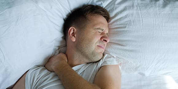 a man with shoulder pain