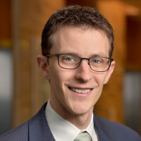 headshot of Eric Young
