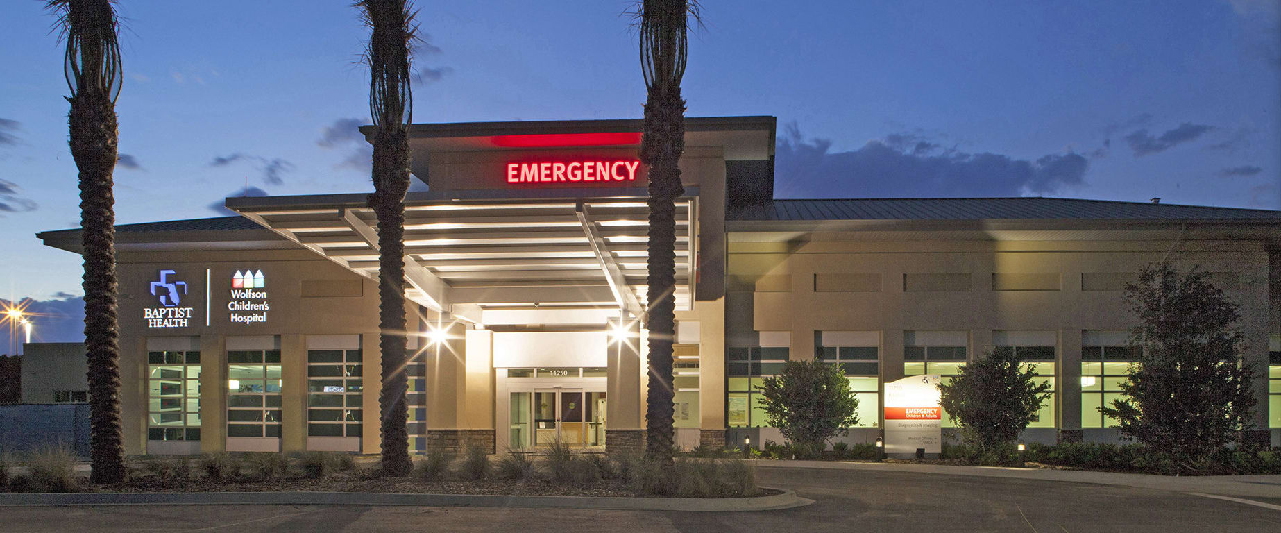 Exterior of the Baptist and Wolfson North emergency room at nightti
