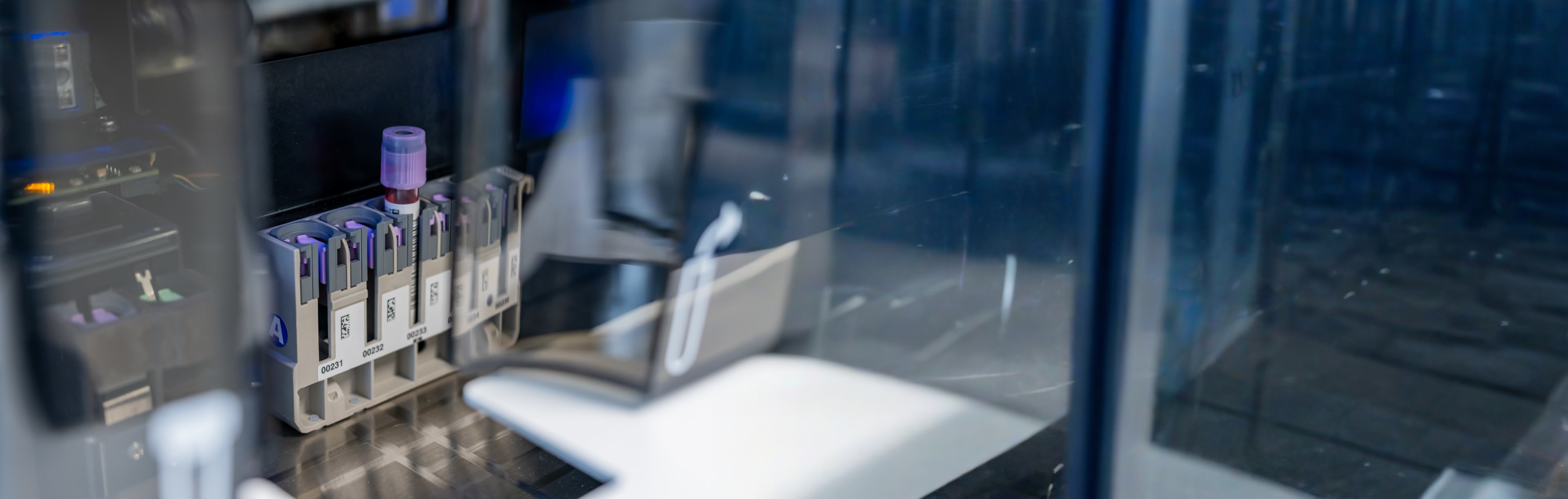 A vial of blood in a canister is ready for analysis by a pathologist at Baptist Health.