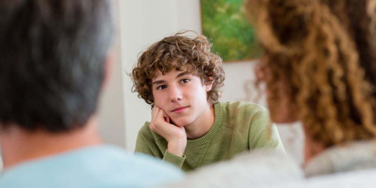 parents talking to teen about HPV vaccine