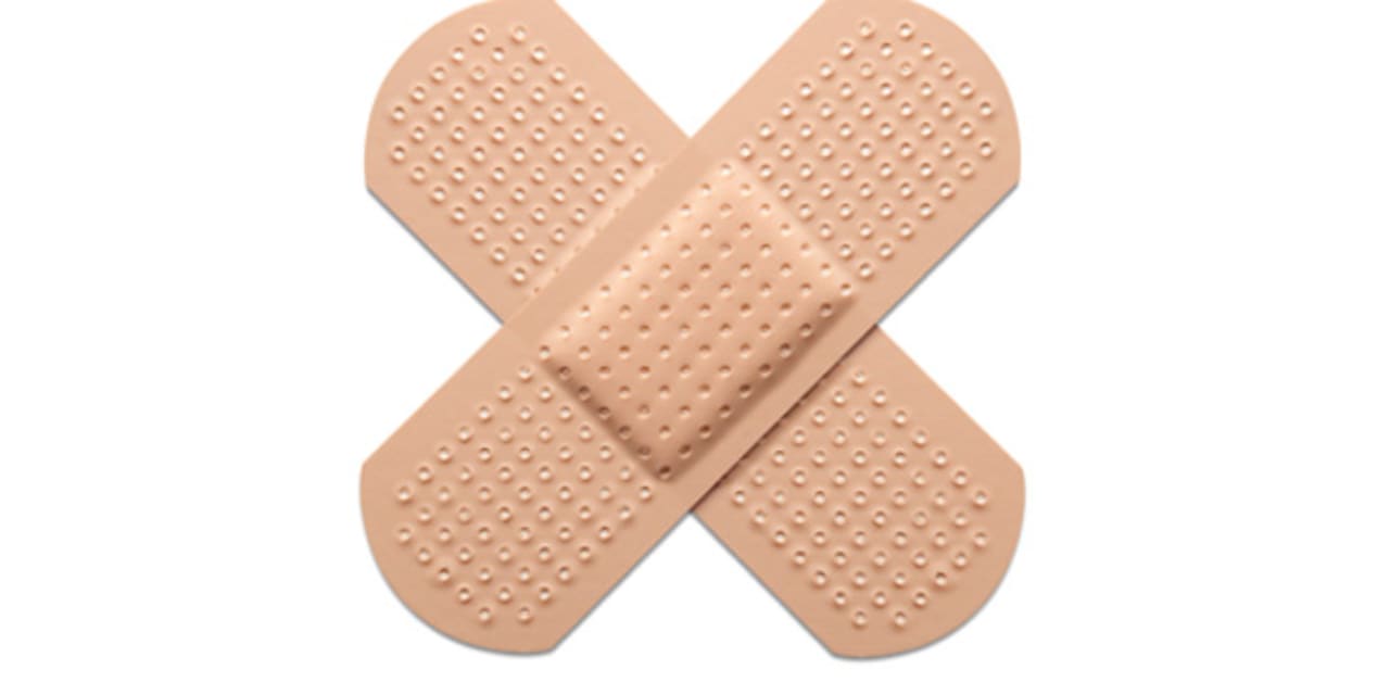 close up picture of two bandaids representing first aid
