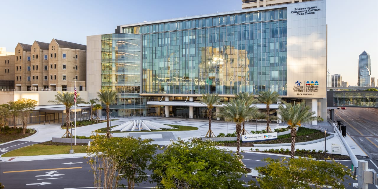 exterior photograph of the wolfson chidlren's critical care tower on a sunny day