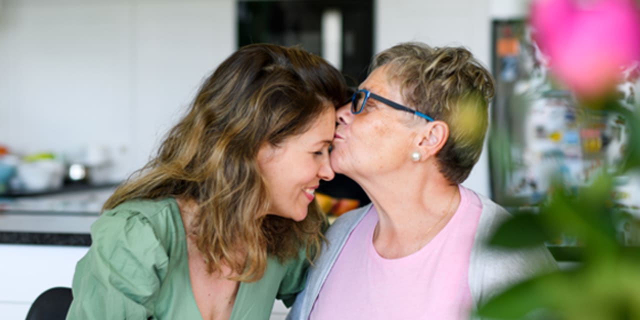 a mother with her adult daughter