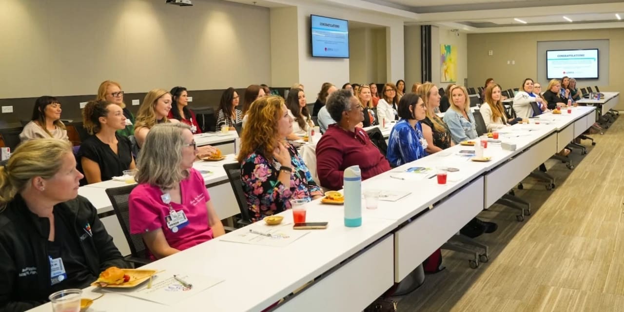 a classroom full of advanced practice providers at an annual symposium.