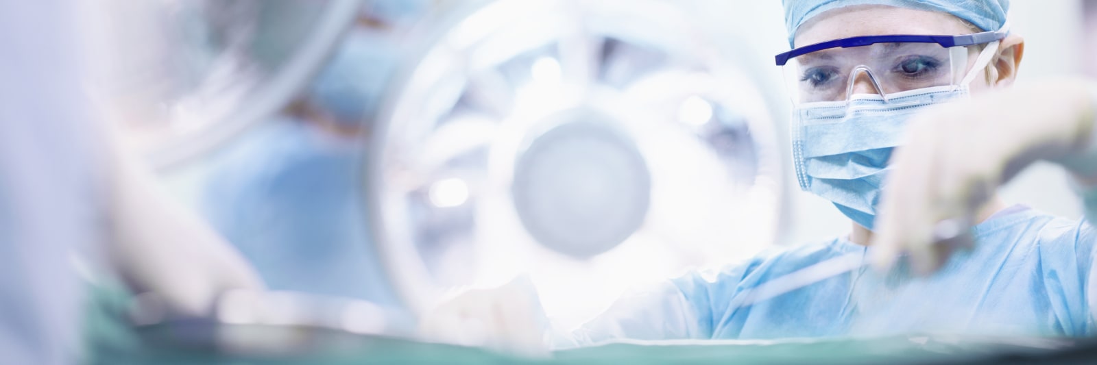 surgeon performing operation in operating room