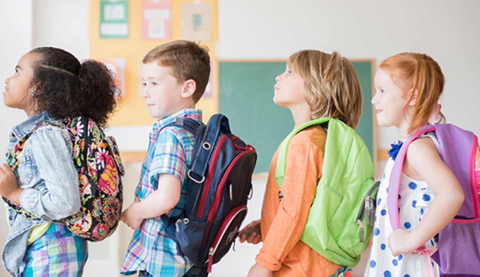 Children carrying backpacks