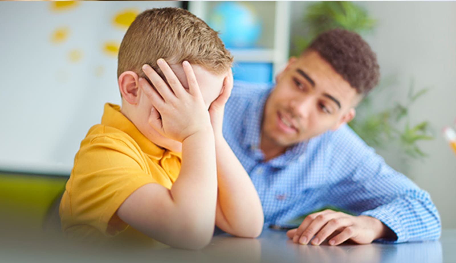adult with upset child