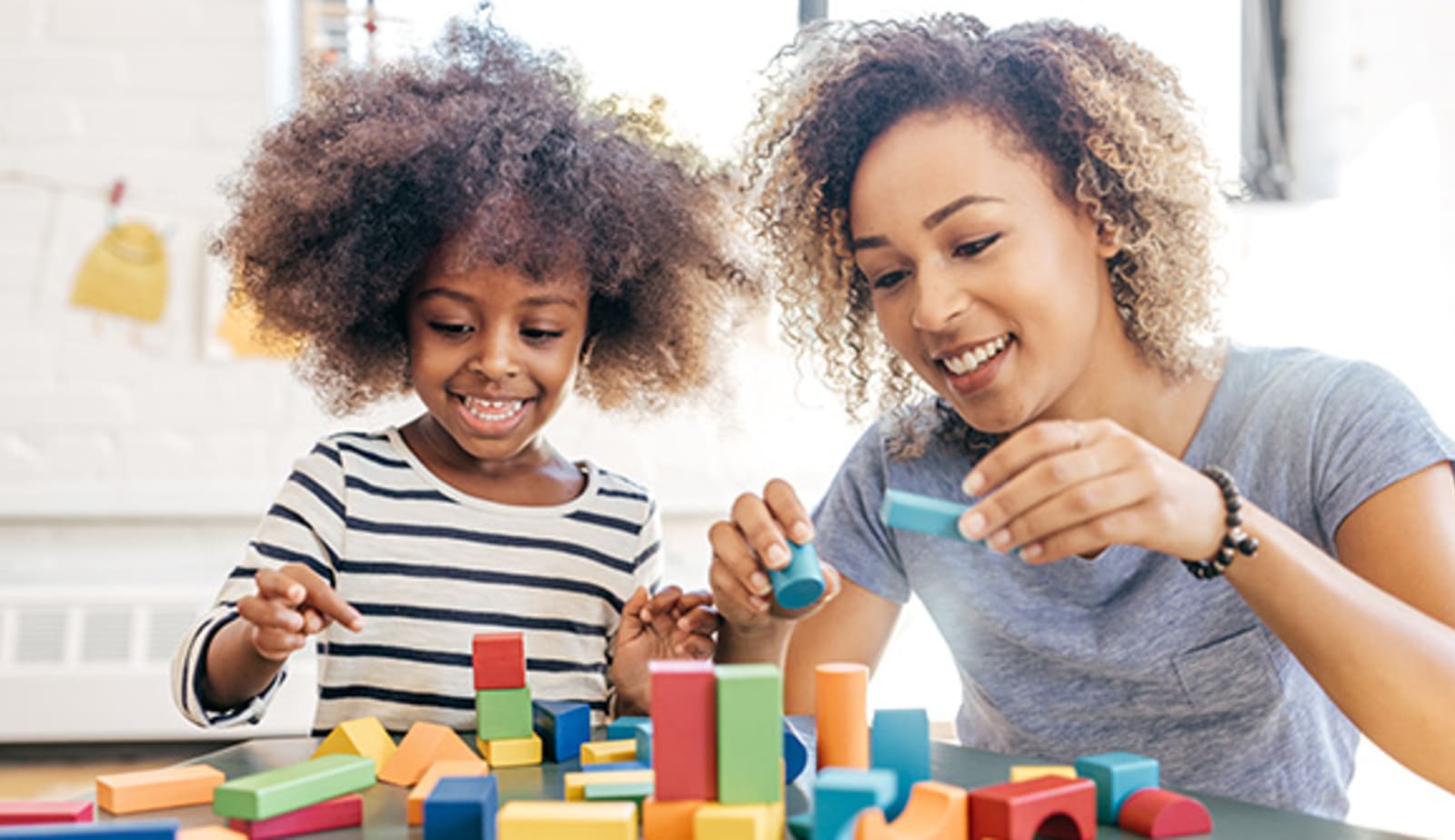 a preschool child and teacher