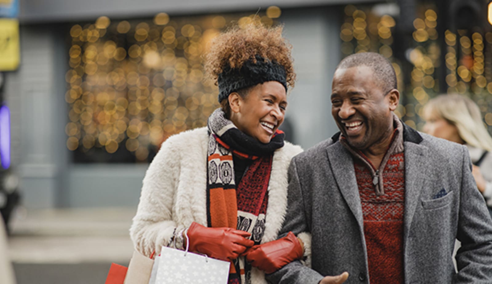 African American couple holiday shopping. 