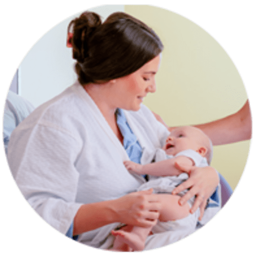 mom and baby in hospital labor and delivery maternity suite