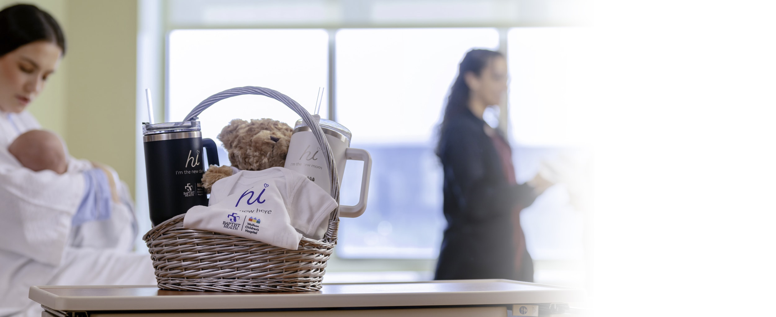 new mom in baptist labor and deliver hospital suite with maternity concierge gifts